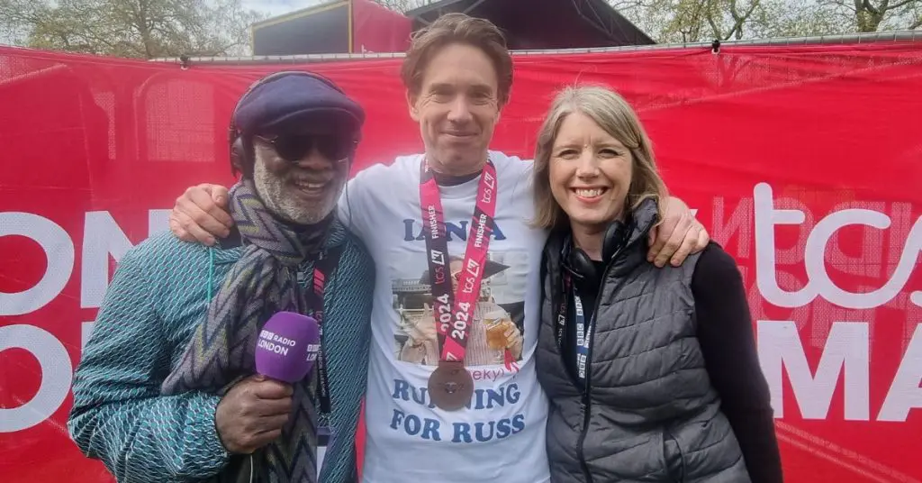Journalist Ian Williams at the finish line of the London Marathon featuring with BBC Radio London Journalists