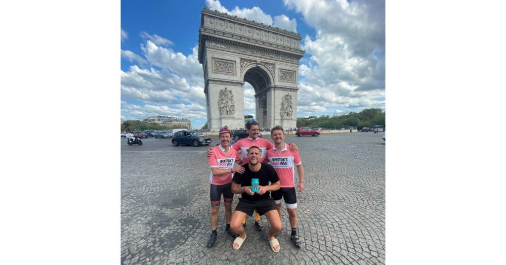 Hunchman Trust members in front of the Arc De Triomphe during their London to Paris cycle for Winston's Wish