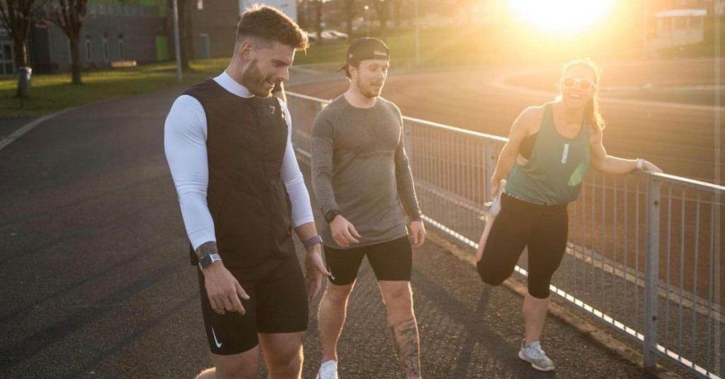 Peter with friends, training for his Ironman Challenge outside