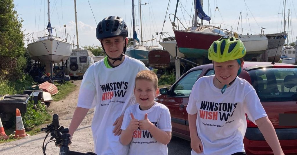 Sam and Thomas in Winston Wish t-shirts as they prepare for their cycle challenge