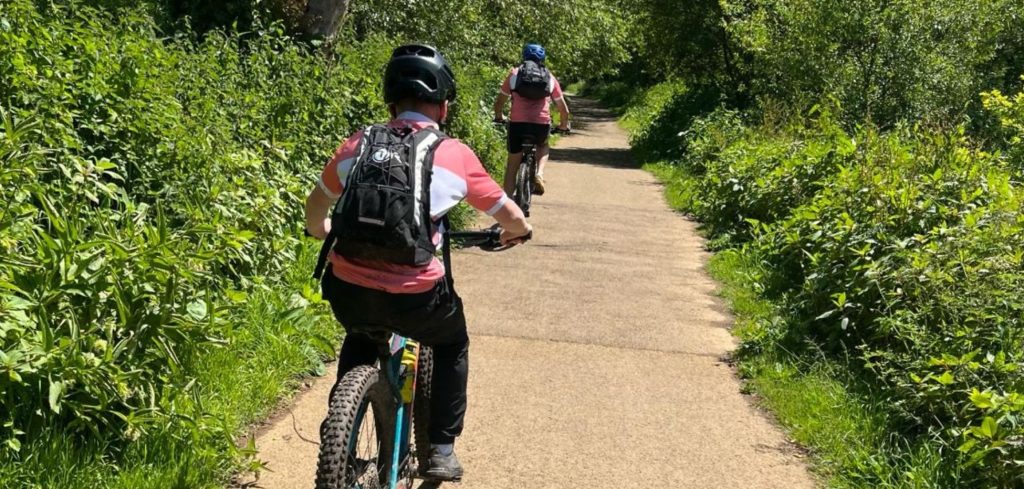 Sam cycling on a country path in the Isle of Wight