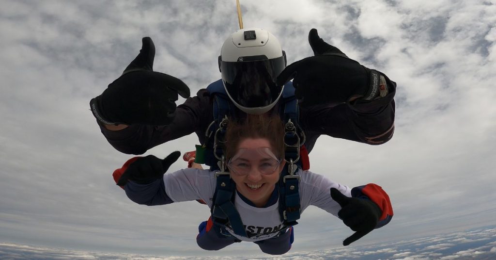 Support mid skydive wearing a Winston's Wish t-shirt