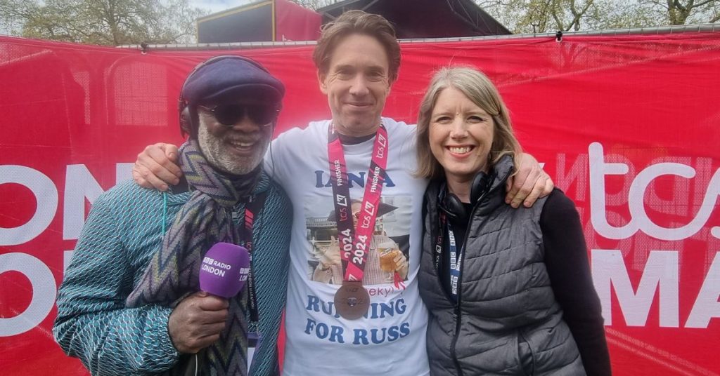 Journalist Ian Williams at the finish line of the London Marathon featuring with BBC Radio London Journalists